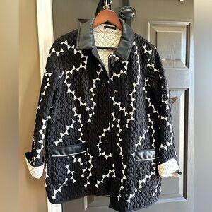 Landi Fancy Reversible Quilted Jacket trimmed in authentic leather.